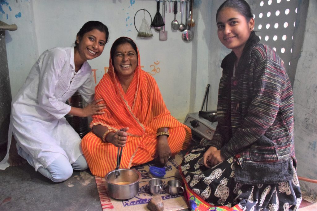 Photograph of Udaan member Anjali, her mother Sita, and her sister, Pooja, who is a sponsored child of World Vision India. (Photo by Neola D’Souza, World Vision)