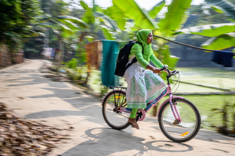 Nobo Jatra’s nutrition facilitator, Rumana, rides her pink bicycle from house to house, educating pregnant mothers on how to care for themselves and their babies.  