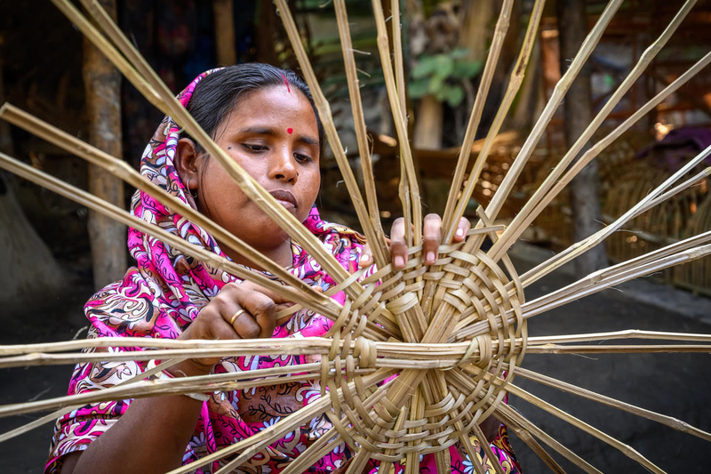 World Vision and USAID supported Shabitri in her bamboo weaving business