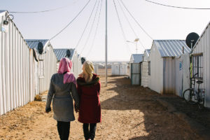 Nour, 14 (left) and her older sister Ghina, 16, both from Damascus, Syria. © 2017 World Vision, Oliver Missen.