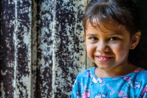 Venezuelan girl fleeing violence and poverty