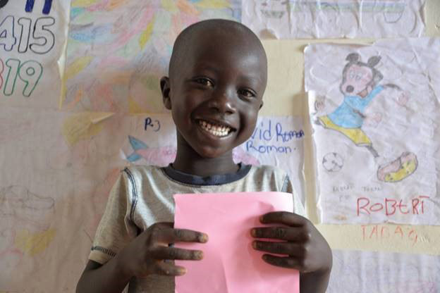 Little girl smiling in school