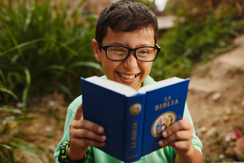 Boy reading the Bible