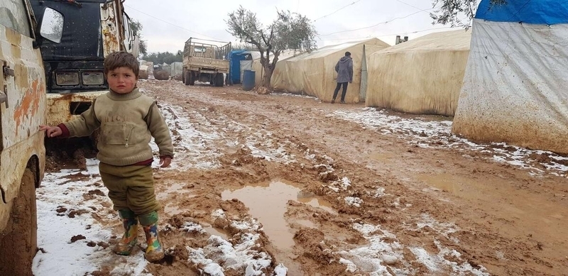 Boy in Syrian refugee camp