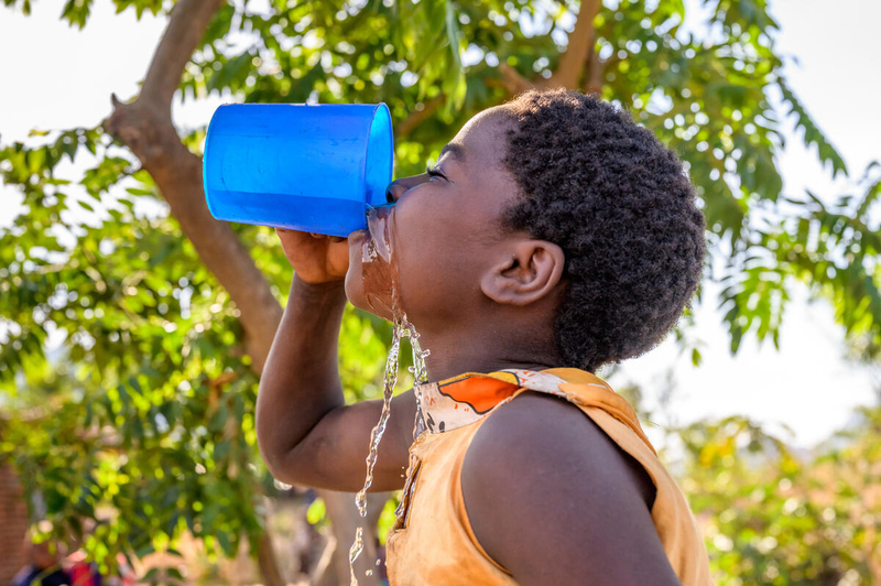 Girl drinks clean water