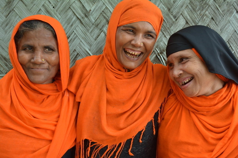 Three refugee women became friends through work in a World Vision Peace Center