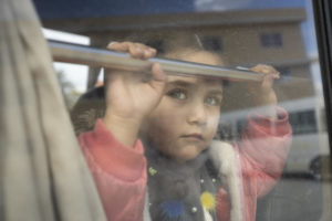 Syrian refugee girl on bus