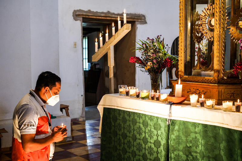 World Vision Honduras staff praying during holy hour
