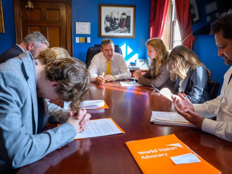 Youth Advocates from Texas pray with their member of Congress